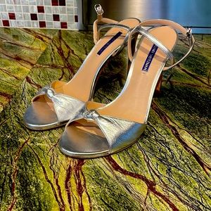 Stuart Weitzmen silver sandals.
